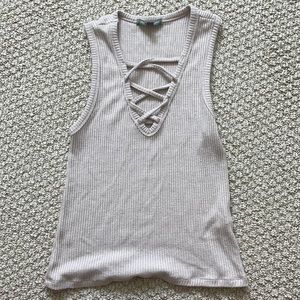 don’t ask why pale pink knit tank os